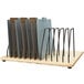 A Jonti-Craft Baltic birch wood tabletop tablet charging station with six slots for tablets.