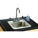 A Jonti-Craft mobile clean hands helper with a stainless steel sink and faucet, with a bottle of liquid.