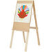 A wooden easel with a drawing of a colorful turkey.