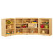 A Jonti-Craft wooden mobile toy storage cabinet with shelves.