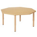 A Jonti-Craft Baltic Birch table with a hexagon shaped top and adjustable legs.