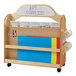 A Jonti-Craft wooden multimedia supply cart with 3 shelves and roll dispensers.