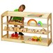 A child playing with toys on a Jonti-Craft wooden storage cabinet.