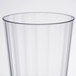 A WNA Comet clear plastic fluted tumbler.