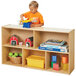 A young boy playing with toys on a Young Time natural low storage shelf.