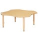 A Jonti-Craft kids table with a star shaped top.