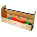 A Jonti-Craft wooden storage step with colorful toys inside.