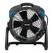 A black and blue XPOWER industrial axial fan on a stand.