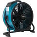 An XPOWER blue and black 18" portable shop fan on a stand.