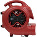 A red XPOWER air blower with a black handle.