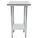 An Advance Tabco stainless steel work table with a galvanized undershelf.