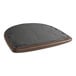 A detached dark brown vinyl seat pad for a Lancaster Table & Seating black side chair.