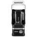 A black KitchenAid commercial blender with a clear glass container.