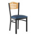 A Lancaster Table & Seating black side chair with a natural wood back and navy seat.