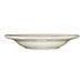 A deep rim stoneware soup bowl in ivory with a scalloped edge and a black rim.