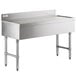 A Regency stainless steel underbar drainboard on a counter.