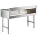 A Regency stainless steel underbar drainboard on a counter.