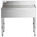 A Regency stainless steel underbar drainboard on a counter.