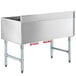 A large stainless steel Regency underbar ice bin with red pegs.