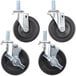 A set of 4 black Avantco swivel stem casters with black rubber wheels.