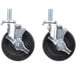 A pair of black Avantco swivel stem caster wheels.