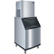 A stainless steel Manitowoc QuietQube remote condenser ice machine with a black top.