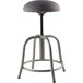 A National Public Seating adjustable stool with a grey seat and grey metal base.