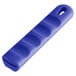 A blue silicone pan handle sleeve with a hole.