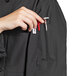 a person holding a tool in their pocket
