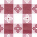 A red and white checkered patterned Intedge vinyl table cover.