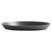A close-up of a black Vollrath Super Perforated Heavy Weight Aluminum Pizza Pan.