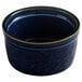 An Acopa Keystone Azora Blue stoneware ramekin on a table with a white background.