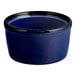 A small, round, blue porcelain ramekin.