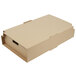 A brown cardboard box with a white lid and handle.