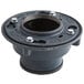 A black Zurn cast iron floor drain with a threaded hole.