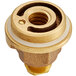 A gold and white metal nut threaded onto brass.