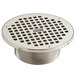 A Zurn polished nickel bronze round drain grate with heel-proof square openings.