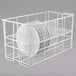 A white metal 10 Strawberry Street dish rack with dinner plates inside.