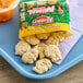 A bag of KEEBLER® Animal Crackers on a tray.