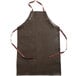 a brown apron with straps