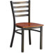 A Lancaster Table & Seating ladder back chair with a wooden seat and black metal frame.