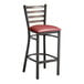 A Lancaster Table & Seating distressed copper finish ladder back bar stool with a burgundy vinyl padded seat.