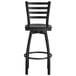A Lancaster Table & Seating black bar stool with a wooden seat and back.