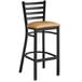 a black and tan bar stool