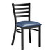 A Lancaster Table & Seating black metal ladder back chair with a navy blue padded seat.