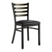 A Lancaster Table & Seating distressed copper ladder back chair with a black cushion.