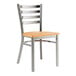 A Lancaster Table & Seating metal ladder back chair with a natural wood seat.