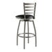 A Lancaster Table & Seating clear coat finish swivel bar stool with a black vinyl padded seat and ladder back.