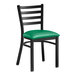 A Lancaster Table & Seating black ladder back chair with a green vinyl padded seat.