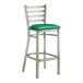 A Lancaster Table & Seating ladder back bar stool with a green vinyl cushion.